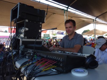  Aaron runs sound at a summer festival 